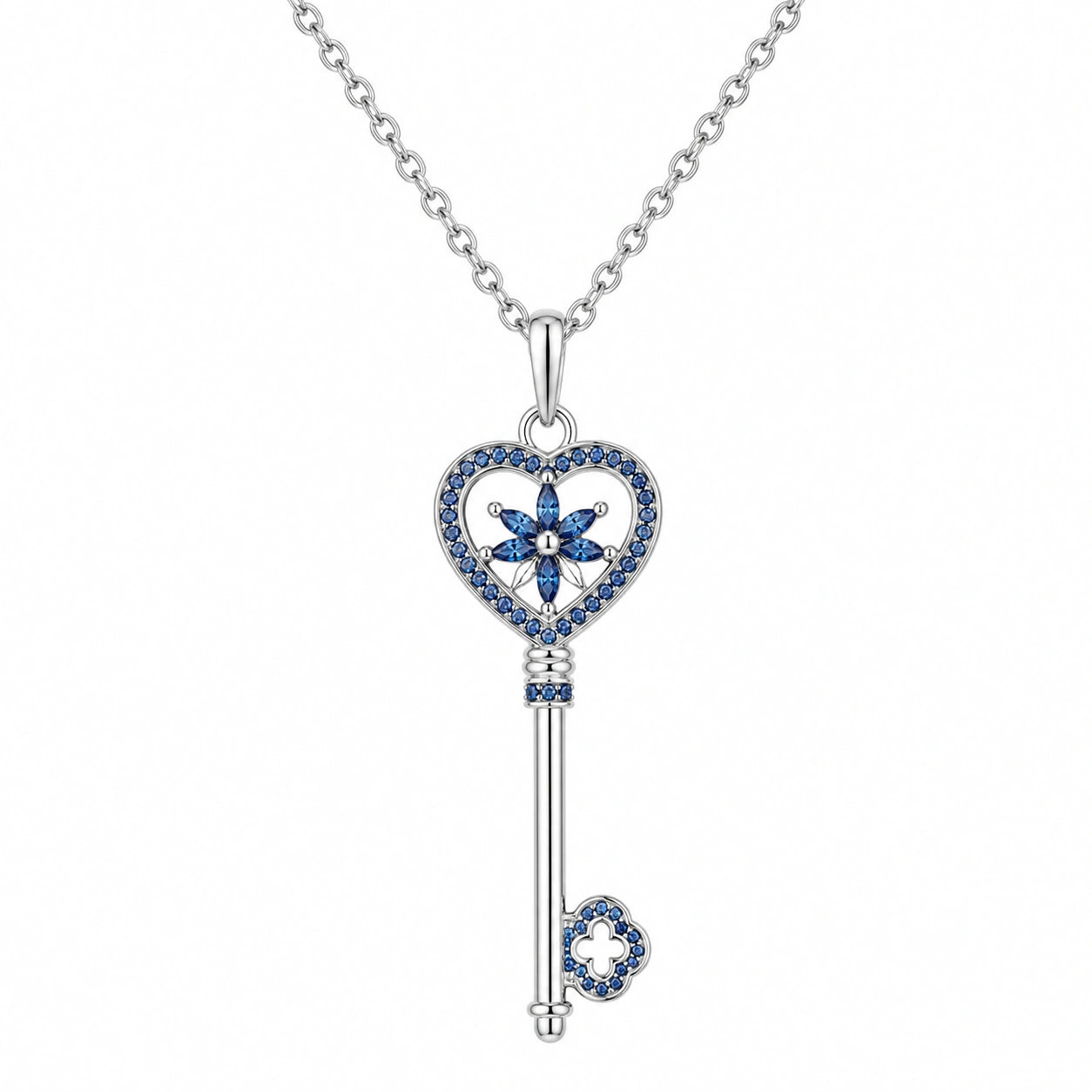 Collana a chiave con pendente a cuore e cristalli blu